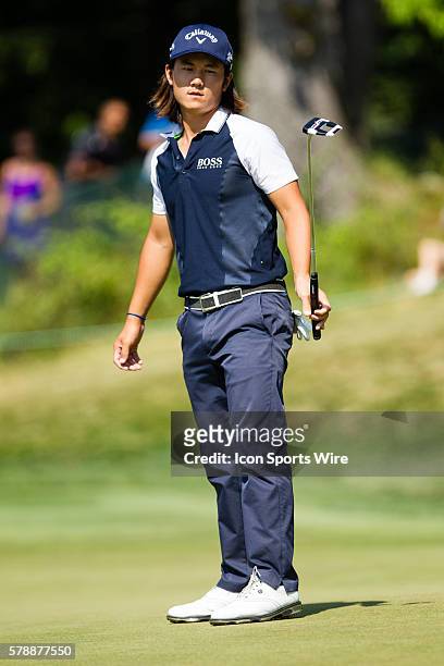 Richard H. Lee reacts after missing a birdie putt on 10 during the final round of the Quicken Loans National at Congressional Country Club in...
