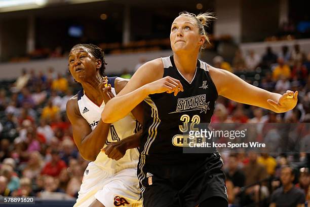 San Antonio Stars center Jayne Appel blocks out Indiana Fever forward Tamika Catchings during the game between the San Antonio Start at Indiana Fever...