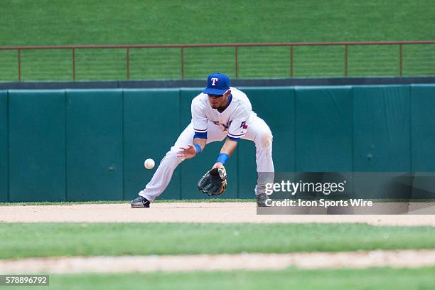 Texas Rangers Infield Luis Sardinas [8619] makes a play on a ground ball during the MLB game between the Seattle Mariners and Texas Rangers played at...