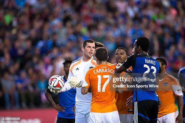 Houston Dynamo goalkeeper Tally Hall reacts after a free kick in the box is called after he picked up the ball on a defensive pass back, as San Jose...