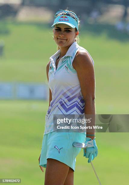 Lexi Thompson of Coral Springs, Florida reacts after missing a birdie putt on the eighteenth hole during the final round of the Airbus LPGA Classic...