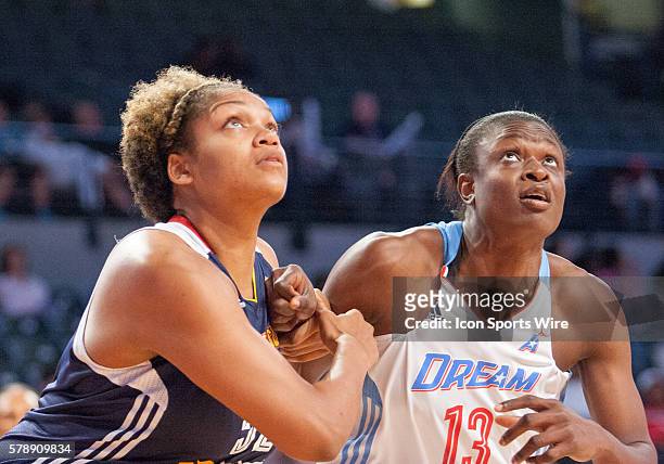 Connecticut's Kelley Cain is battling Atlanta's Aneika Henry for a rebound in Atlanta Dream 83-71 victory over the Connecticut Sun at McCamish...