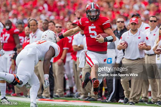 Wisconsin Badgers quarterback Tanner McEvoy runs down the sideline as the Wisconsin Badgers defeated the Bowling Green Falcons at Camp Randall...