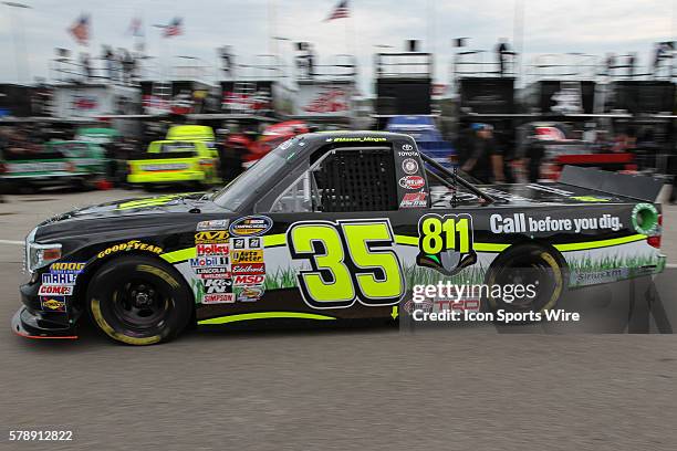 Mason Mingus, driver of the No. 35 Call 811 Toyota, during practice for the NASCAR Camping World Truck Series American Ethanol 200 presented by...