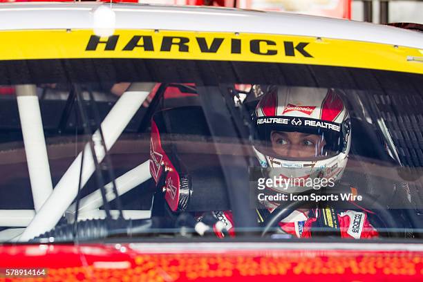 Chase contender, Kevin Harvick sits in the cockpit of his Budweiser Chevrolet waiting for the start of Saturday mornings practice for the NASCAR...