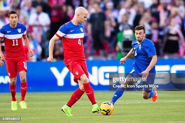 United States midfielder Michael Bradley midfielder Michael Bradley passes the ball past Azerbaijan midfielder Gara Garayev , during the game between...