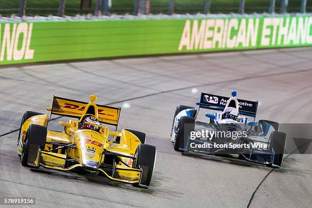 IndyCar Driver Ryan Hunter-Reay passes IndyCar Driver Juan Pablo Montoya during the running of the Iowa Corn Indy 300 presented by DEKLAB at Iowa...