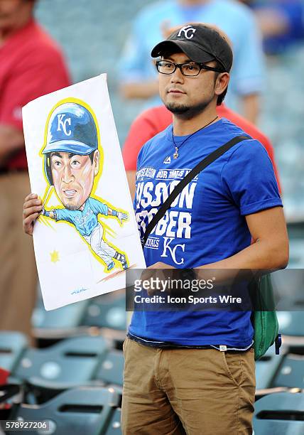 Fan holding a painting of Kansas City Royals outfielder Nori Aoki before ALDS game one between the Los Angeles Angels of Anaheim and the Kansas City...