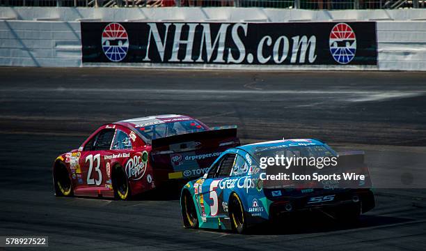 Alex Bowman hits the track in his Dr. Pepper Toyota with Kasey Kahne in his Great Clips/Shark Week Chevrolet during practice for the Camping World RV...