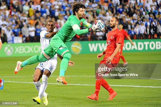 Turkey goal keeper Tolga Zengin makes a save on shot by Honduras forward Jerry Bengtson in a Road to Brazil friendly match at RRK Memorial stadium in...