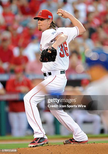 Los Angeles Angels of Anaheim pitcher Jered Weaver tries a pickoff throw to first base during game one of the ALDS against the Kansas City Royals...