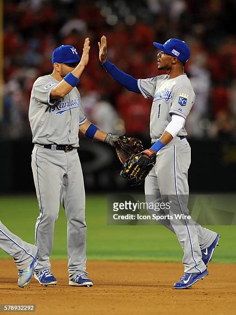 Kansas City Royals Jarrod Dyson on the field with Omar Infante after the Royals defeated the Los Angeles Angels of Anaheim 3 to 2 in ALDS game one...
