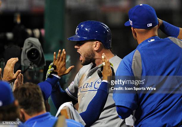 Kansas City Royals Mike Moustakes in the dugout after hitting a solo home run in the eleventh inning during ALDS game one against the Los Angeles...