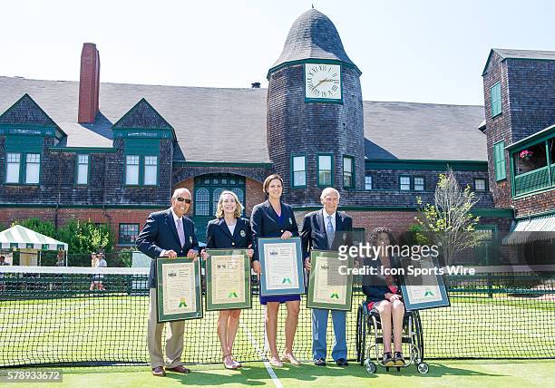 The 2014 induction class from left to righ Nick Bollettieri, Jane Brown Grimes, Lindsay Davenport, John Barrett and Chantal Vandierendonck pose for a...