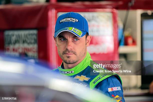 Sprint Cup Series Casey Mears driver of the No. 13 GEICO Chevrolet SS Chevrolet in the garage during practice for Camping World RV Sales 301 at New...