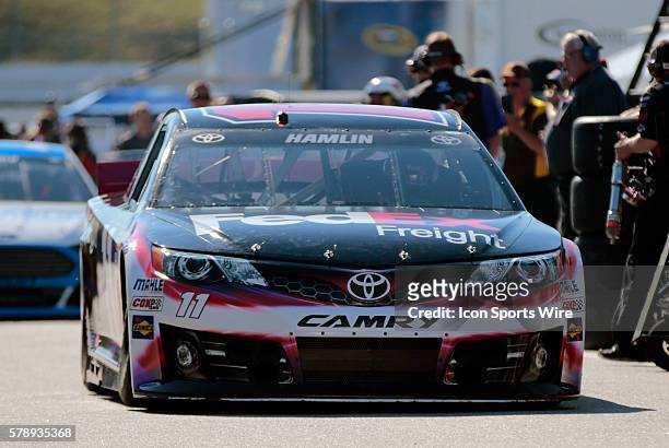 Sprint Cup Series Denny Hamlin driver of the FedEx Freight Toyota during practice for Camping World RV Sales 301 at New Hampshire Motor Speedway in...