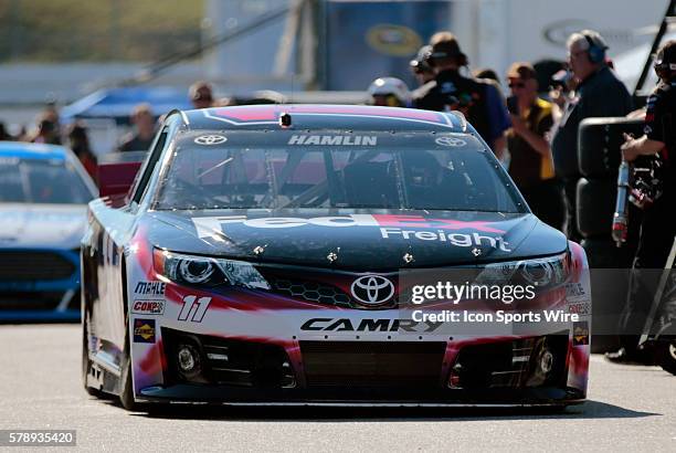 Sprint Cup Series Denny Hamlin driver of the FedEx Freight Toyota during practice for Camping World RV Sales 301 at New Hampshire Motor Speedway in...