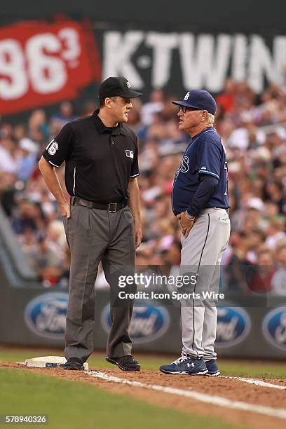 July 18, 2014 Tampa Bay manager Joe Maddon challenges the call by first base umpire Mike DiMuro at the Minnesota Twins game versus Tampa Bay Rays at...