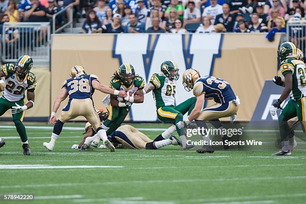 July 2014 Eskimos Jamal Miles runs back a punt during the Eskimos vs Bombers game at the Investors Group Field in Winnipeg MB.