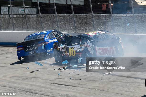 Sprint Cup driver Greg Biffle and Ricky Stenhouse Jr crash during the FedEx Autism Speaks 400 at Dover International Speedway in Dover, DE.