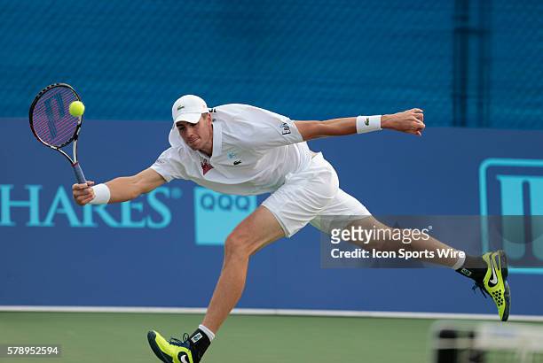 Boston Lobsters John Isner stretches his nearly 7 foot frame to return a shot. The Boston Lobsters met the Philadelphia Freedoms in a World Team...