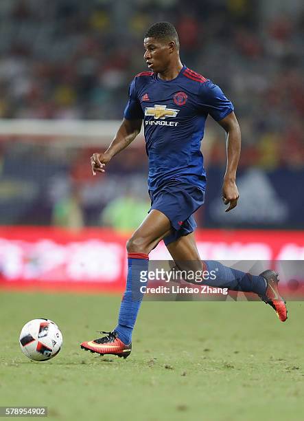 Marcus Rashford of Manchester United competes for the ball during the International Champions Cup match between Manchester United and Borussia...
