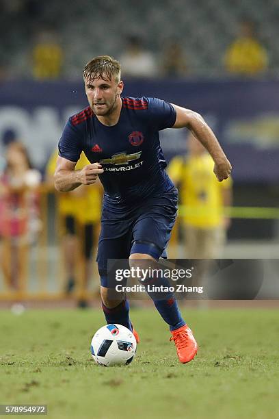 Luke Shaw of Manchester United competes for the ball during the International Champions Cup match between Manchester United and Borussia Dortmund at...