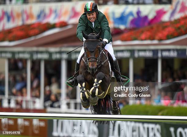 Dublin , Ireland - 22 July 2016; Cian O'Connor, Ireland, completes a clear round on Good Luck in his team's last run to qualify for a jump-off...