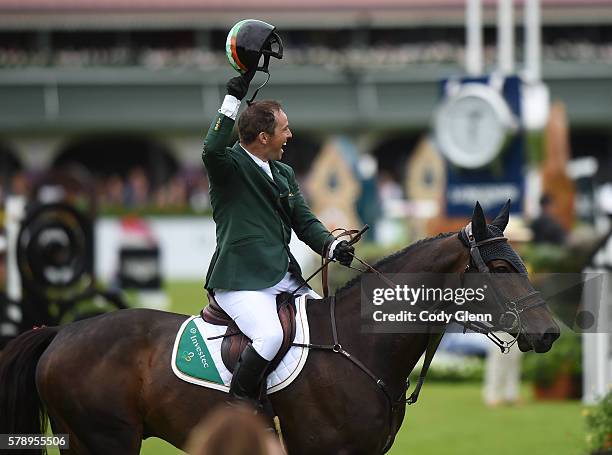Dublin , Ireland - 22 July 2016; Cian O'Connor, Ireland, celebrates a clear round on Good Luck in his team's last run to qualify for a jump-off...