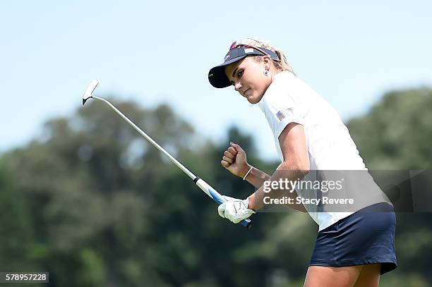 Lexi Thompson of the United States reacts after making a putt on the 15th green to win the match 4&3 over Thailand during the four-ball session of...