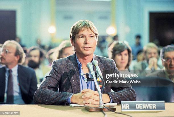 American musician John Denver appears at the PMRC senate hearing at Capitol Hill, Washington DC, United States, 19th September 1985. Representatives...