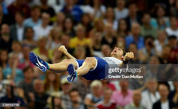 Renaud Lavillenie of France celebrates making a jump during the mens pole vault Day One of the Muller Anniversary Games at The Stadium - Queen...