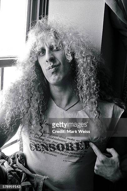 American musician Dee Snider of Twisted Sister wearing a t-shirt with a 'Censored' slogan, pictured in a hotel room during the PMRC senate hearing at...