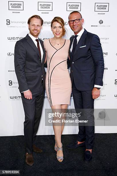 Andreas Rebbelmund, Annett Moeller and Andreas Rebbelmund attend the Breuninger show during Platform Fashion July 2016 at Areal Boehler on July 22,...