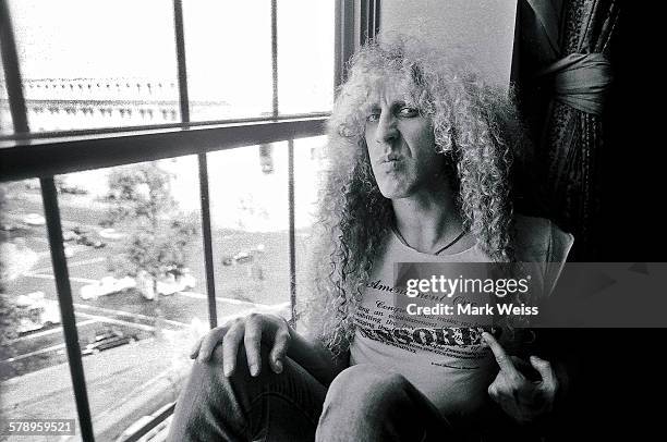 American musician Dee Snider of Twisted Sister wearing a t-shirt with a 'Censored' slogan, pictured in a hotel room during the PMRC senate hearing at...