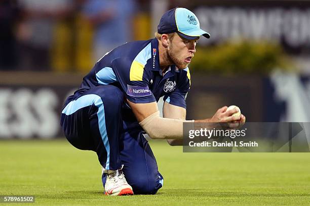 David Willey of Yorkshire catches the ball from Rory Kleinveldt of Northampton during the NatWest T20 Blast match between Yorkshire Vikings and...