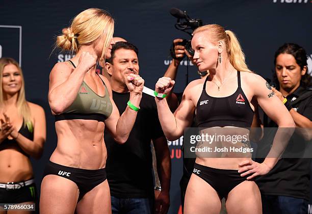Opponents Holly Holm and Valentina Shevchenko of Kyrgyzstan face off during the UFC weigh-in at the United Center on July 22, 2016 in Chicago,...