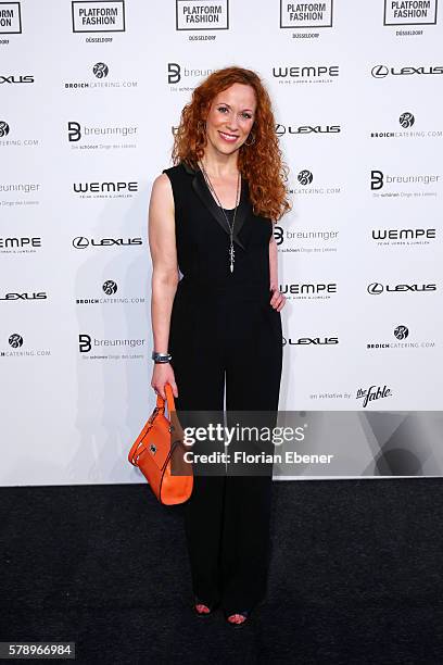 Guest attends the Breuninger show during Platform Fashion July 2016 at Areal Boehler on July 22, 2016 in Duesseldorf, Germany.