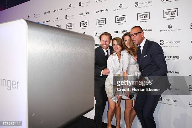 Thomas Hoehn, Alessandra Lapp, Isabell Lapp and Andreas Rebbelmund attend the Breuninger after party during Platform Fashion July 2016 at Areal...
