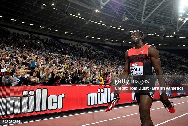 Usain Bolt of Jamaica after winning the men's 200m on Day One of the Muller Anniversary Games at The Stadium - Queen Elizabeth Olympic Park on July...