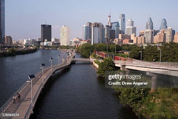 View of downtown Philadelphia, overlooking the Schuylkill River and Schuylkill Banks Boardwalk, July 22, 2016 in Philadelphia, Pennsylvania. The...