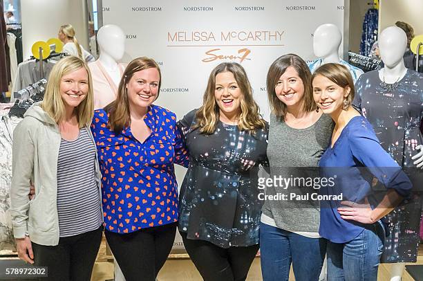 Actress Melissa McCarthy, center, poses with fans during a promotion for her fashion line Melissa McCarthy Seven7 at Nordstrom Downtown Seattle on...