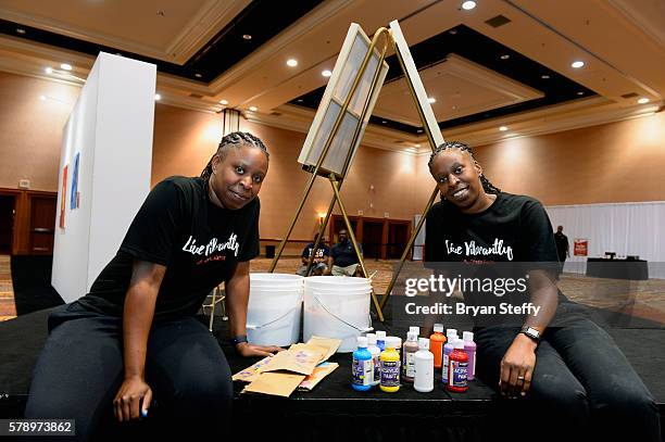 Artists Rebecca Crouch and Rachel Crouch attend the State Farm Color Full Lives Art Gallery during the 2016 State Farm Neighborhood Awards at...