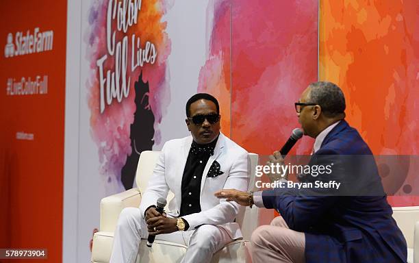 Singer Charlie Wilson and journalist and host Ed Gordon speak at the State Farm Color Full Lives Art Gallery during the 2016 State Farm Neighborhood...