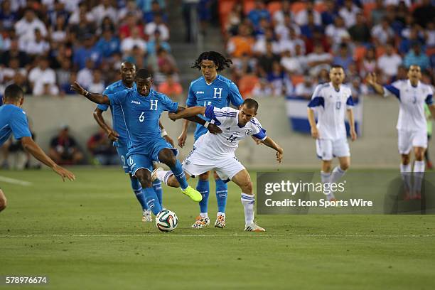 Honduras defender Juan Garcia battles with Israel midfielder Neftali Vermouth Gil during the FIFA International friendly soccer match, Honduras vs...