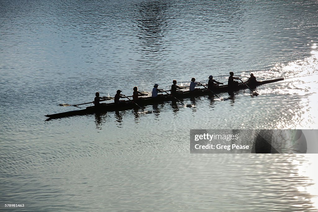 Coxed Eight Sweep Rowing Team At Sunrise High-Res Stock Photo - Getty ...
