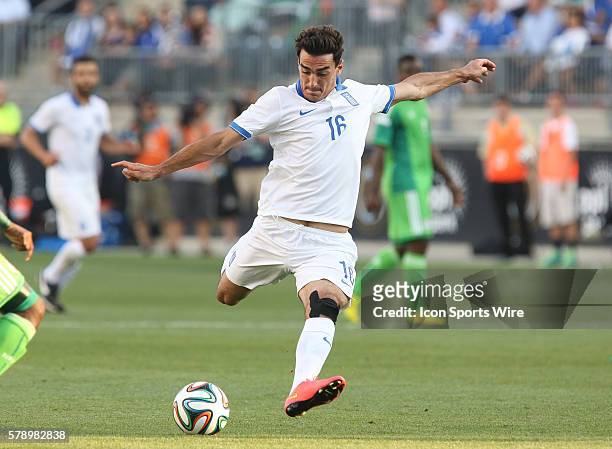 Greek national football team Lazaros Christodoulopoulos shoots the ball at the net during an international friendly Soccer match against the Nigerian...