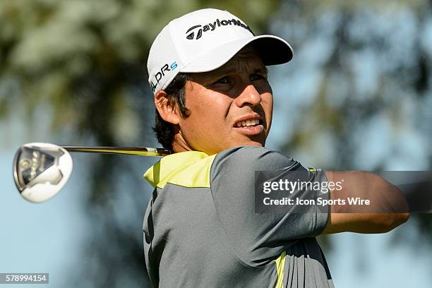 Andres Romero of Argentina tees off on the 10th during the first round of the 2014 RBC Canadian Open at the Royal Montreal Golf Club in Ile Bizard...