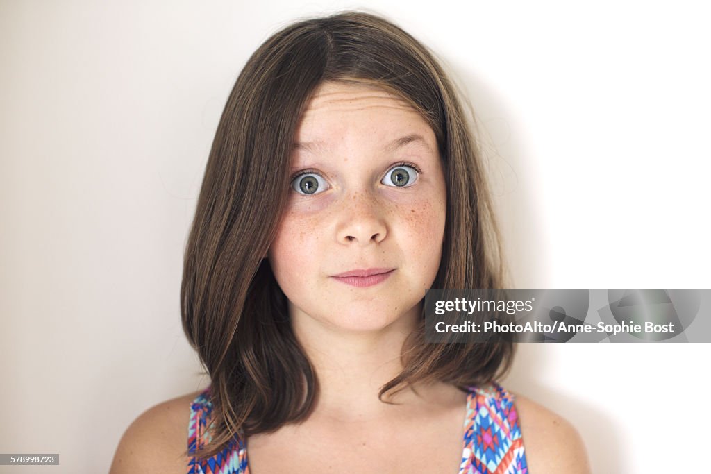 Girl with surprised expression on face, portrait