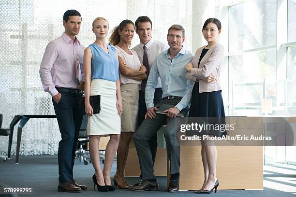 business team, portrait - group of businesspeople standing low angle view stock pictures, royalty-free photos & images